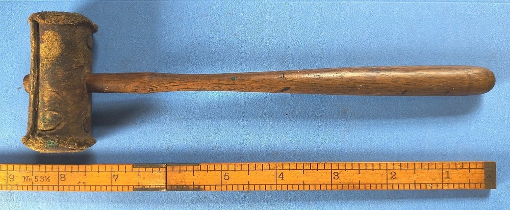Vintage small rolled-leather mallet