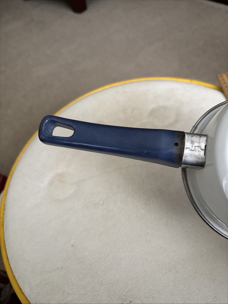 Vintage White Enamel Saucepan With Blue Handle