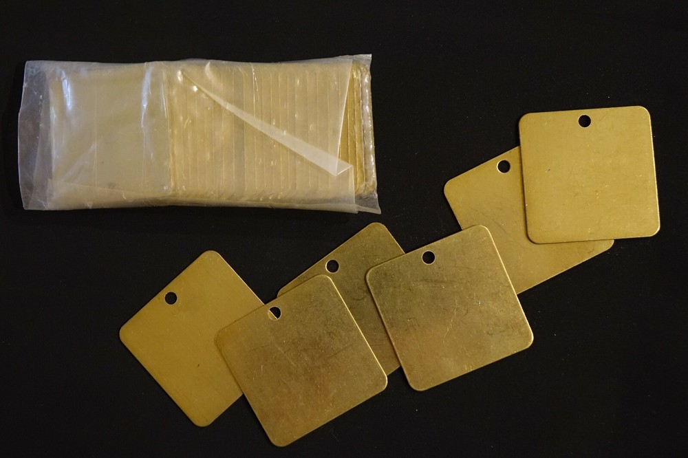 Brass tags 2 inches,new.25 pieces.