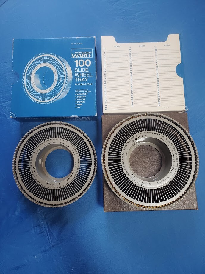 Two 1960's Montgomery Ward 100 Slide Wheel Trays 67-3473