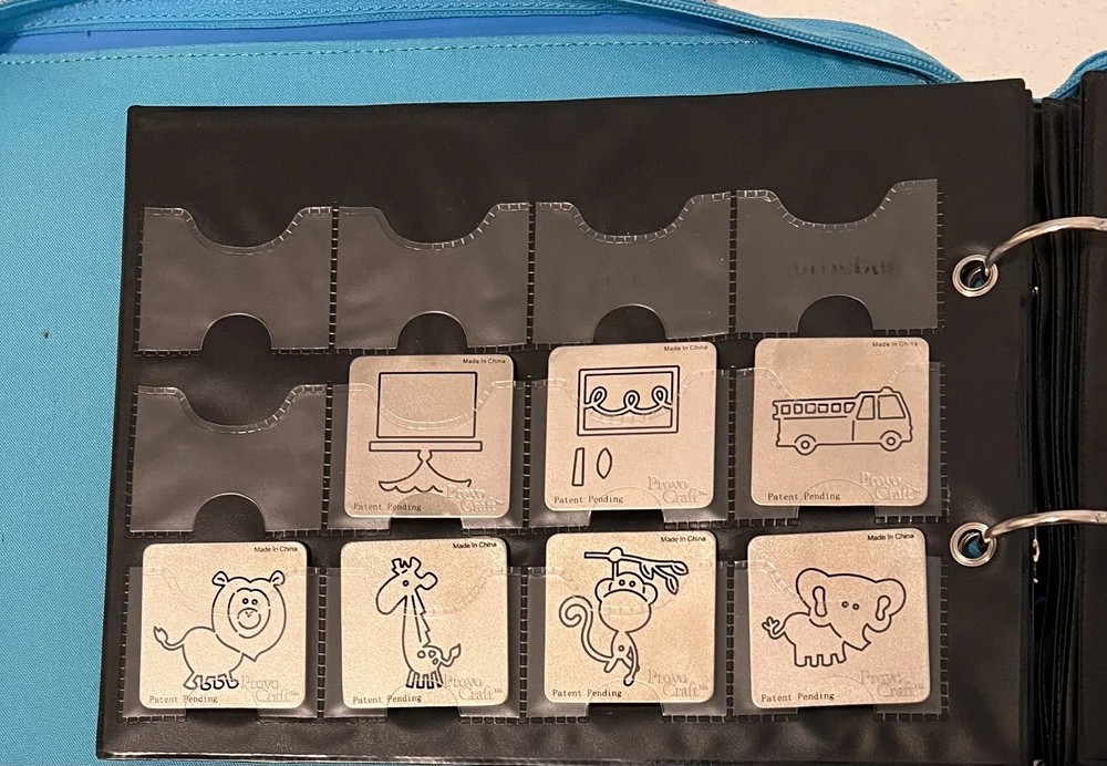 Cuttlebug Storage Binder + 42 Cutting and Embossing Folders + 7 Pouch Page Lot