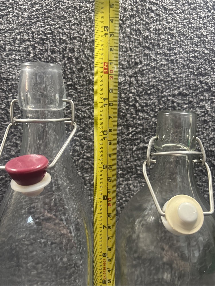 2 Old Fashioned Style Bottles With Flip Lids