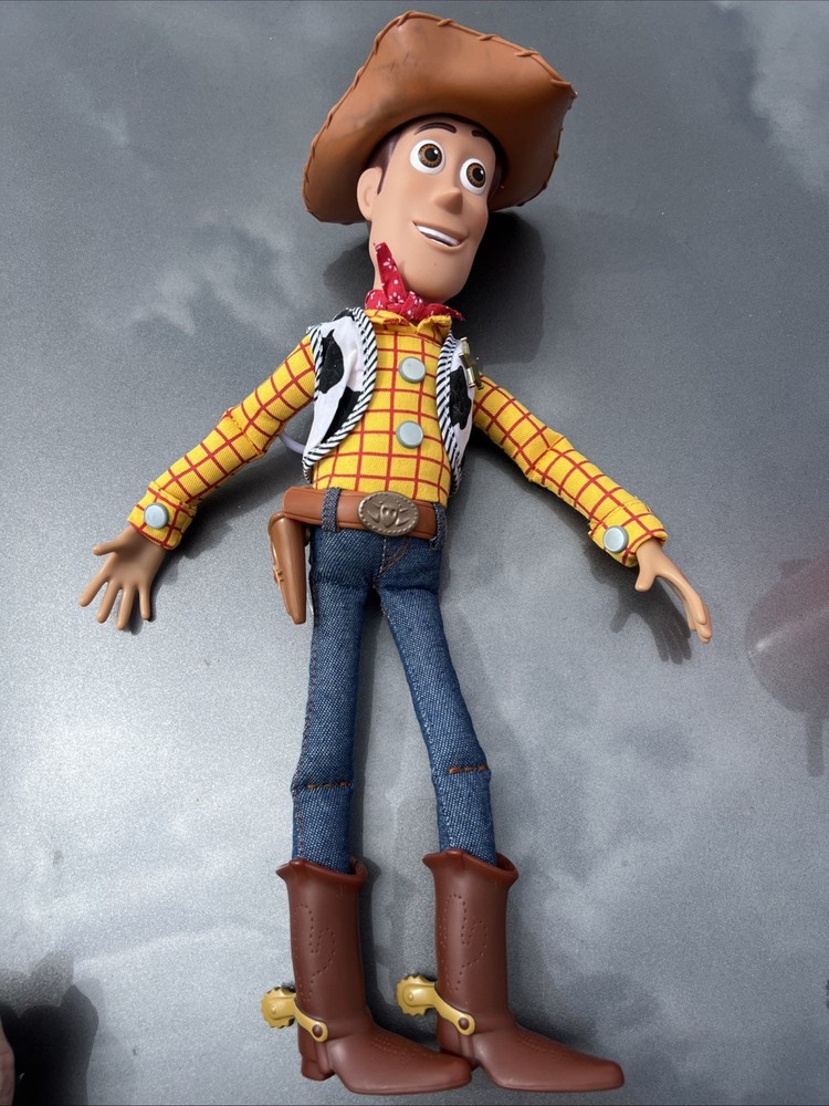Woody  pull string doll.