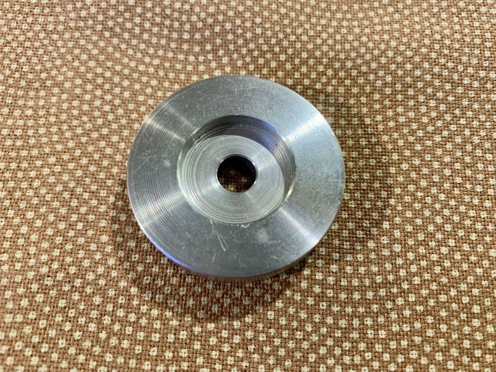 Technics SL-1200MKII record adapter.