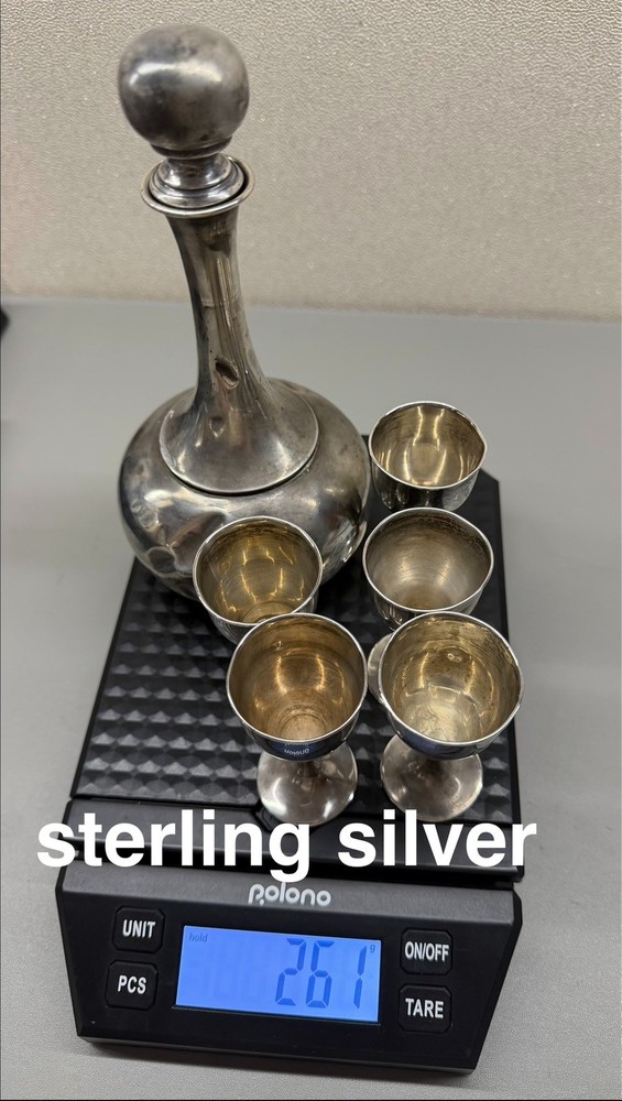 sterling silver decanter with five cups  261g