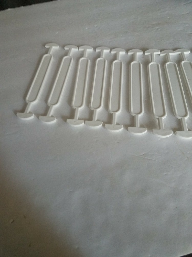 Handles To Carry 2 Plastics Bottles Together