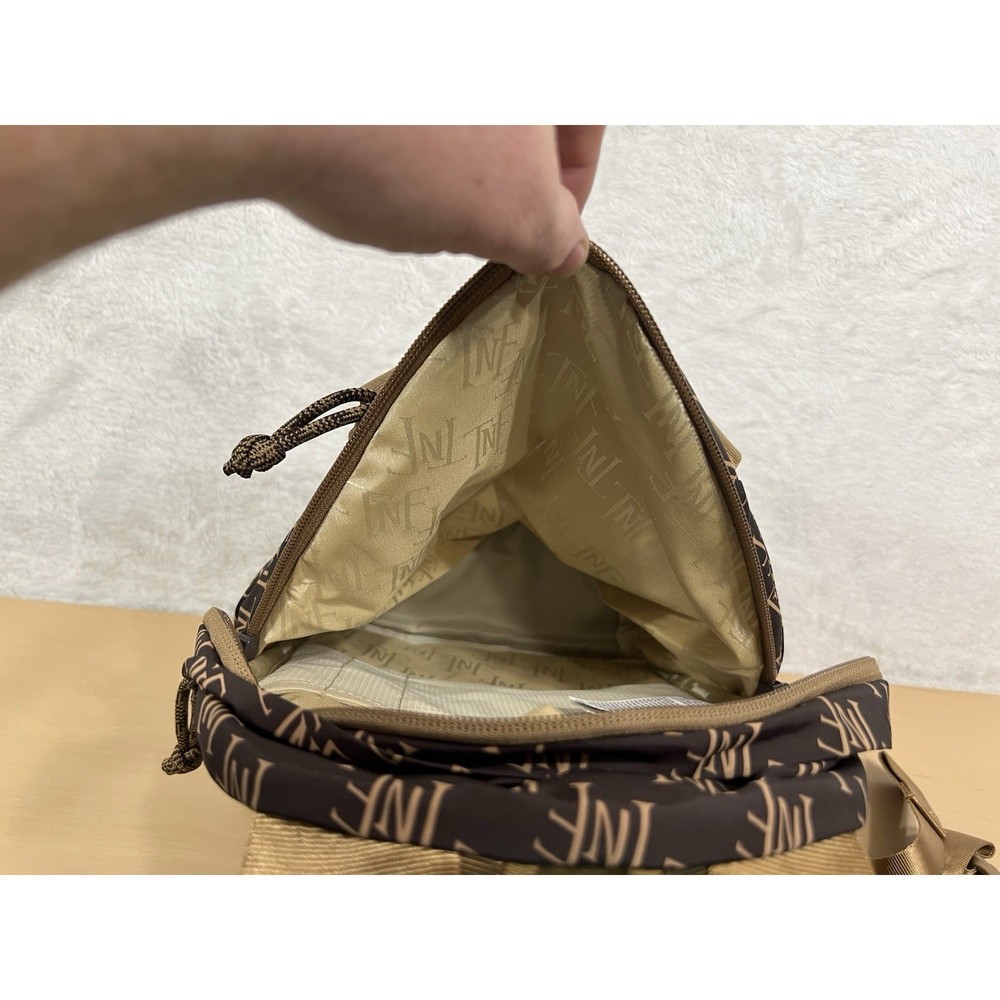The North Face Never Stop Mini Backpack 5L Brown Tan Monogram NF0A81DV