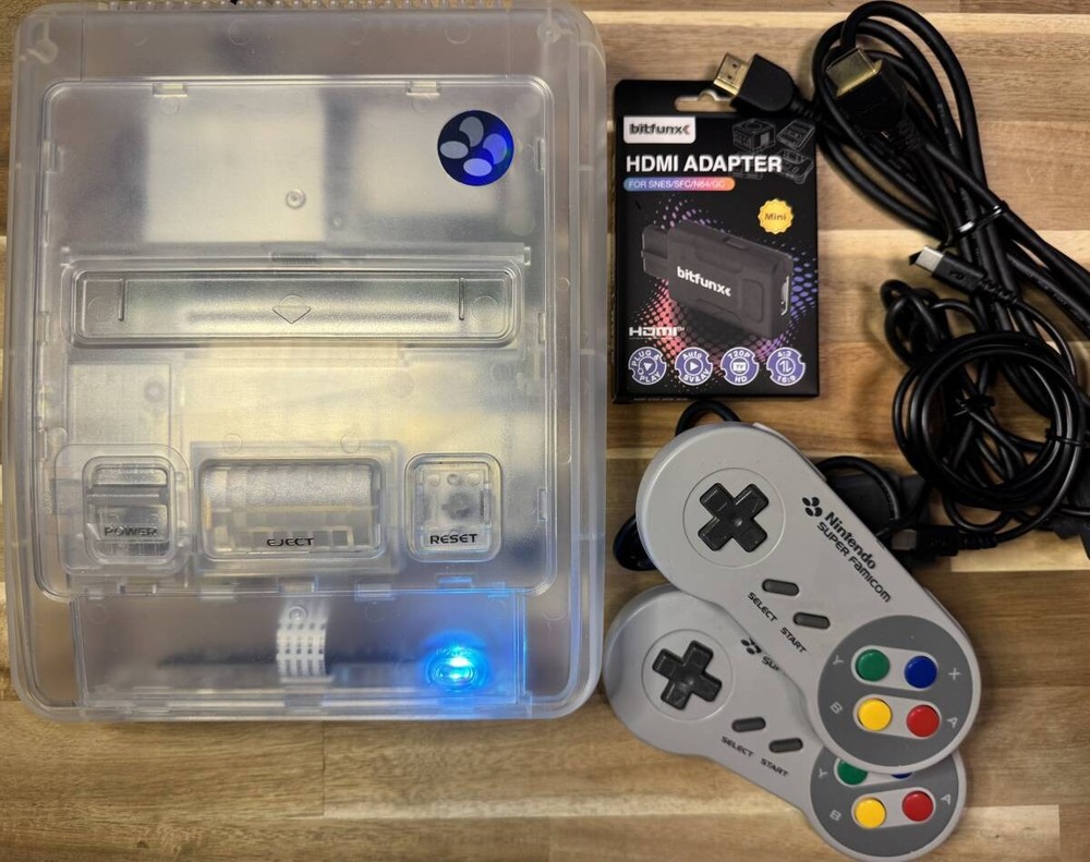 Super Famicom (mid-generation) clear shell HDMI adapter with USB power supply