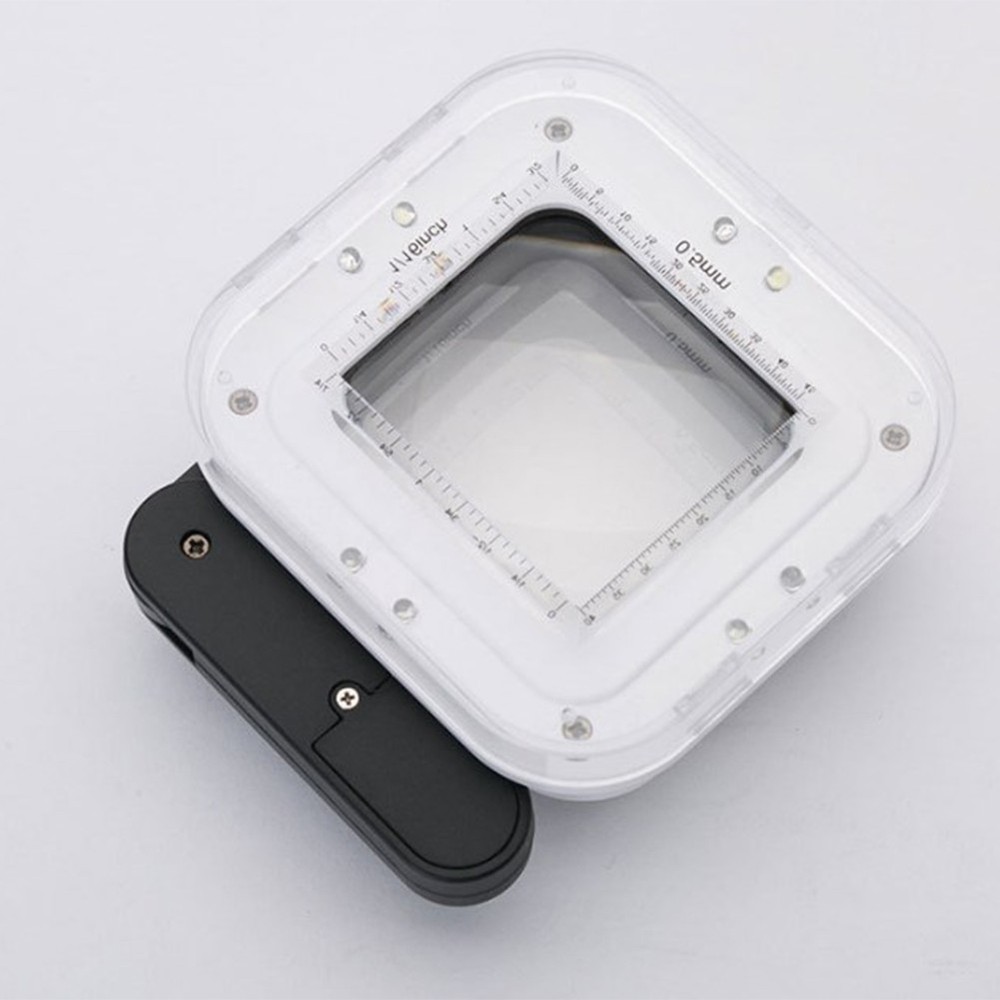 Folding handheld magnifier with four LED lights and precise detachable scale