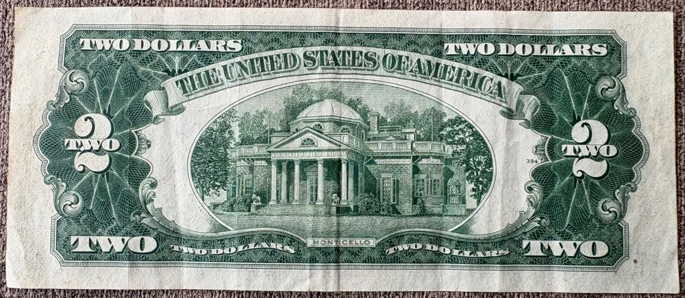 Red seal note: $2 1953 series, circulated