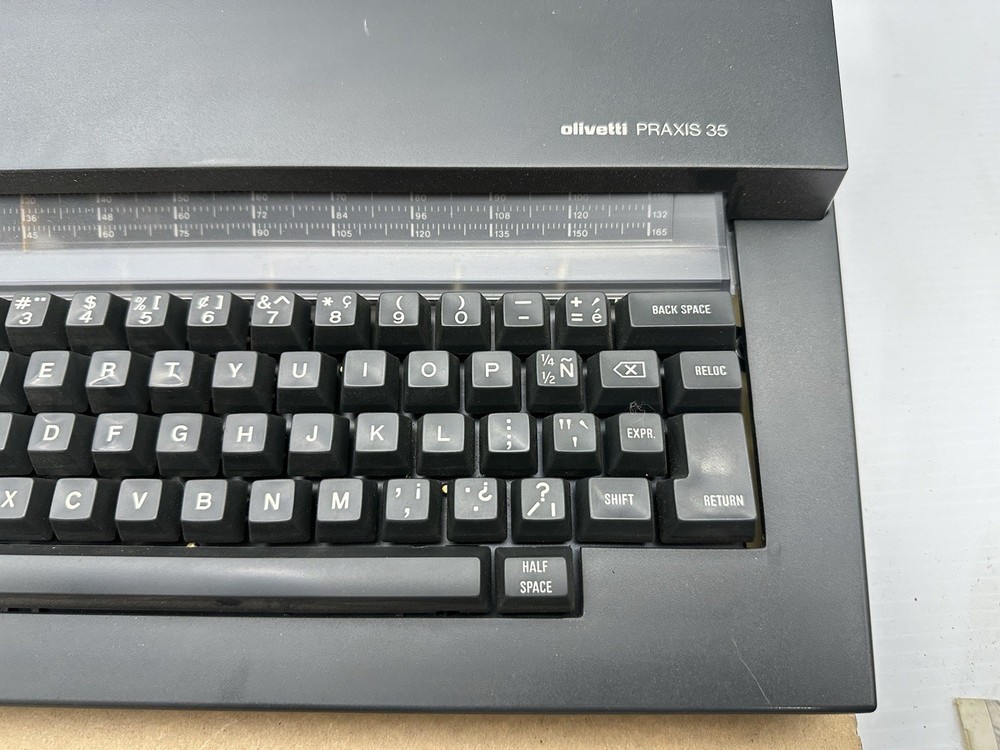 Olivetti PRAXIS 35 Typewriter w/Plastic Hard Case 1980s Powers On Needs Service*