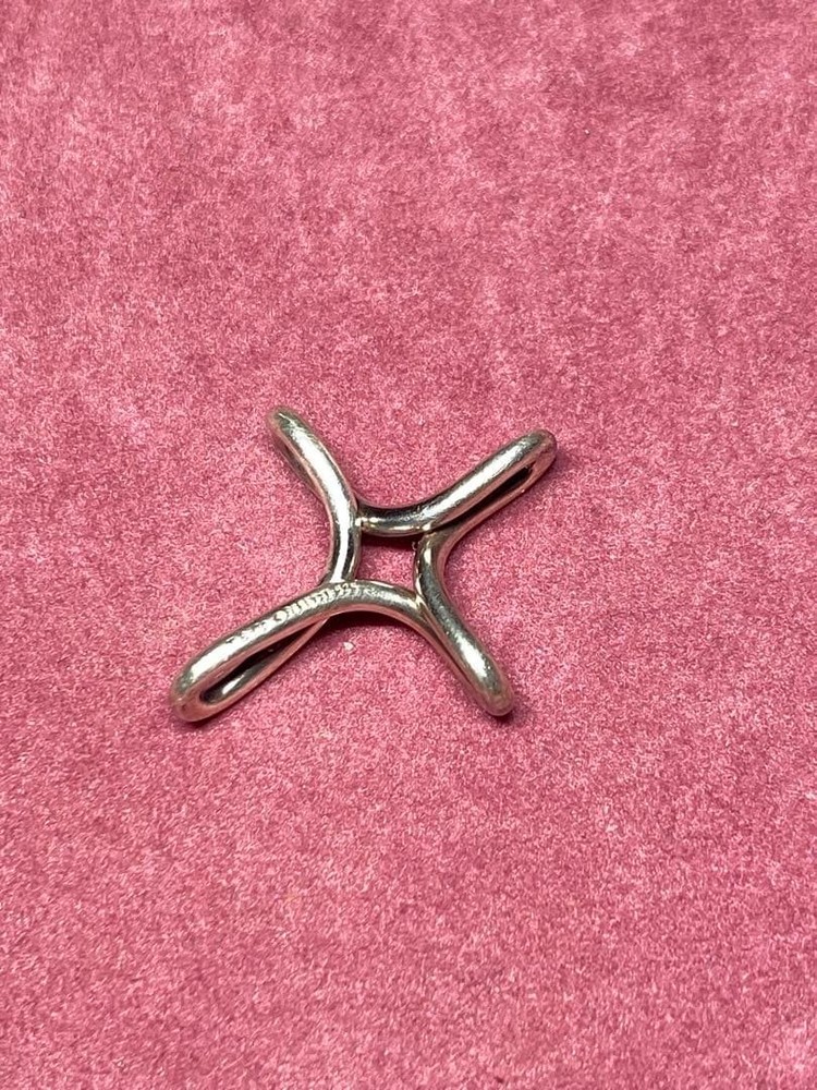Cross-shaped necklace component, Tiffany & Co. Infinity Cross