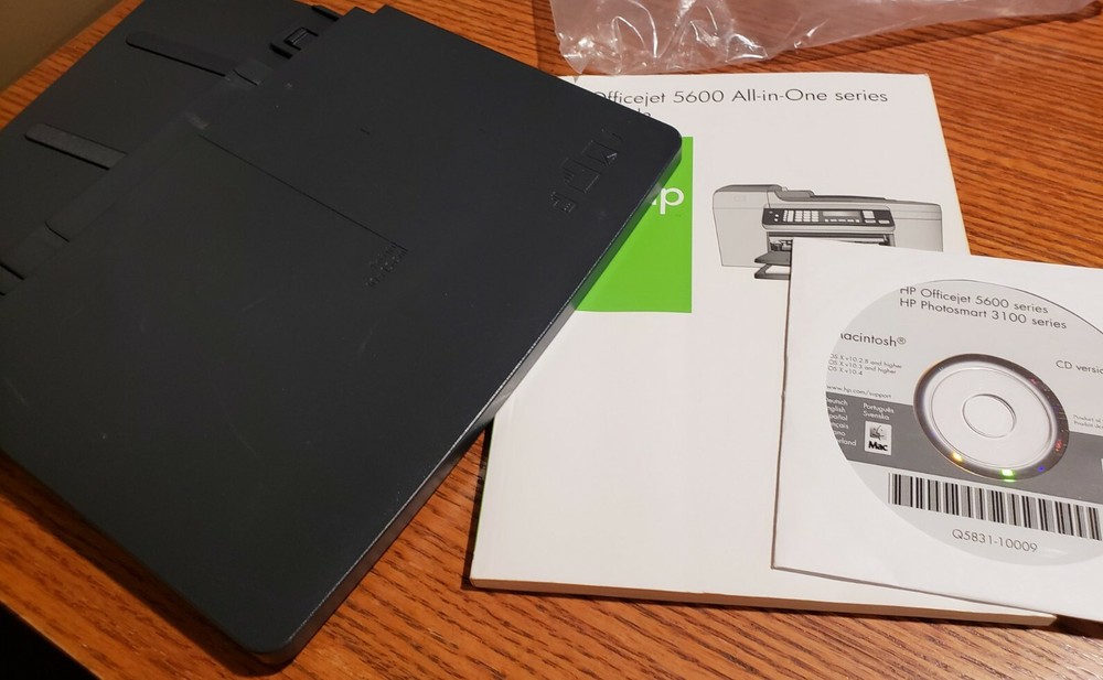 HP Officejet 5600 Manual and Mac Software CD and printer trays