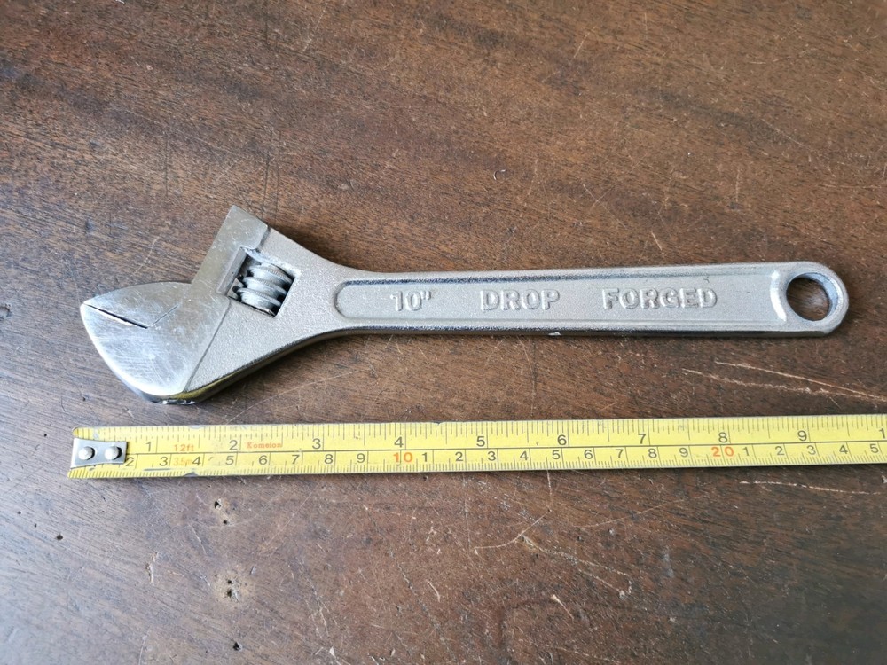 Modern 10" Adjustable Spanner to clear, no makers name.