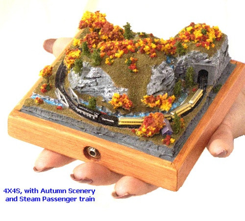 Incredible 4"x4" running train layout, hand-held !