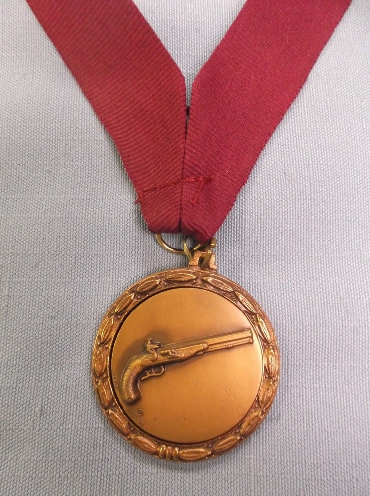 bronze metal insert gun medal maroon neck drape