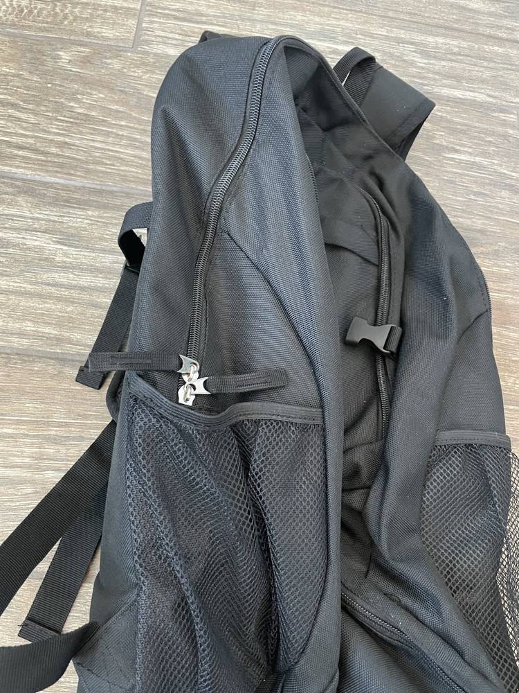 IRONMAN Triathlons, Backpack, Non Race Specific. Features The M-Dot Logo