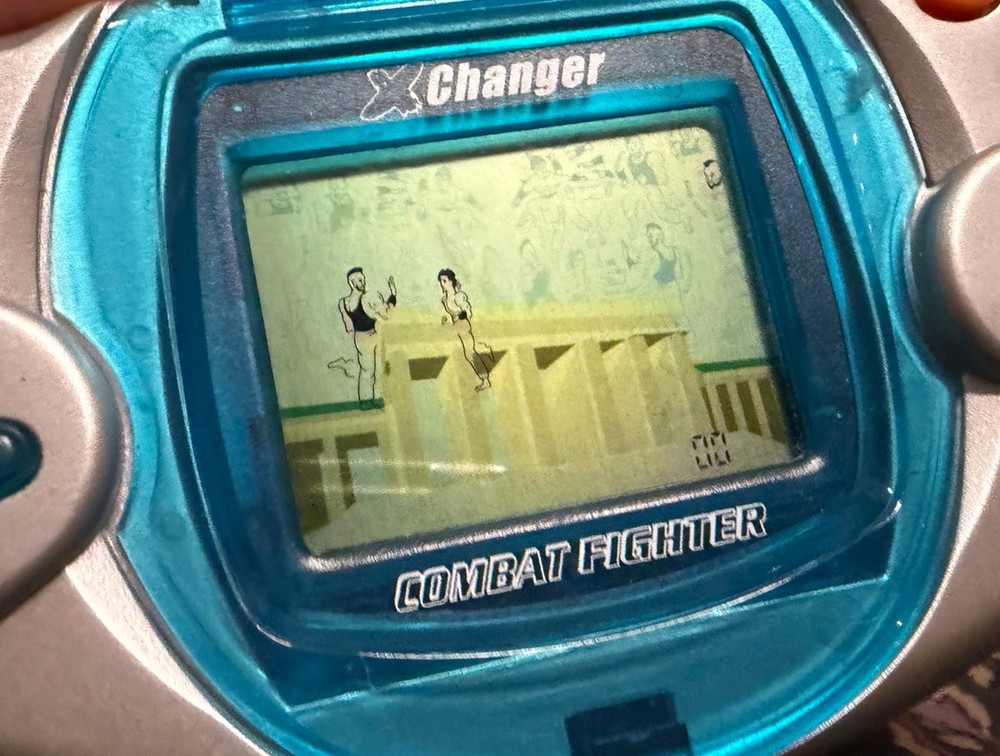 Vintage X-Changer "Combat Fighter" Handheld LCD Electronic Game Tested & Working