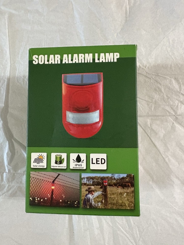 Motion activated solar alarm lamp