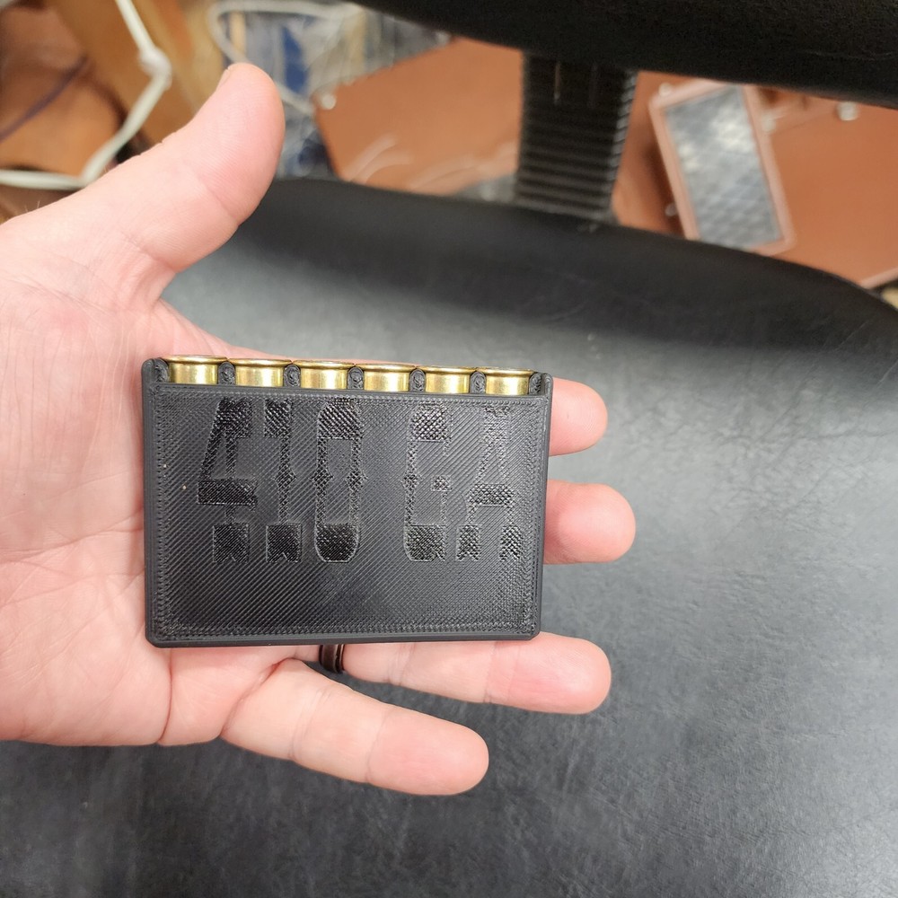 Shell Holder for 410 ga shells. Holds 6 for EDC.  Compact way to carry extra...