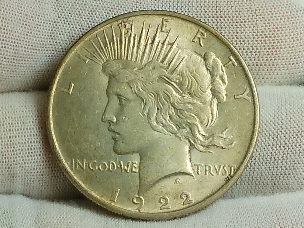 Raw 1922 Peace Silver Dollar - Philadelphia