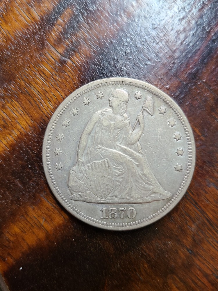 1870 Seated Liberty Dollar Fine