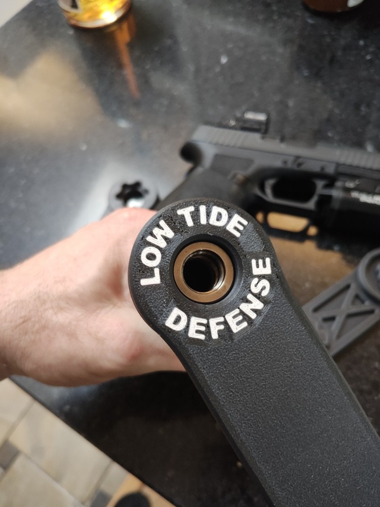 Rugged obsidian 9/45 suppressor tool.