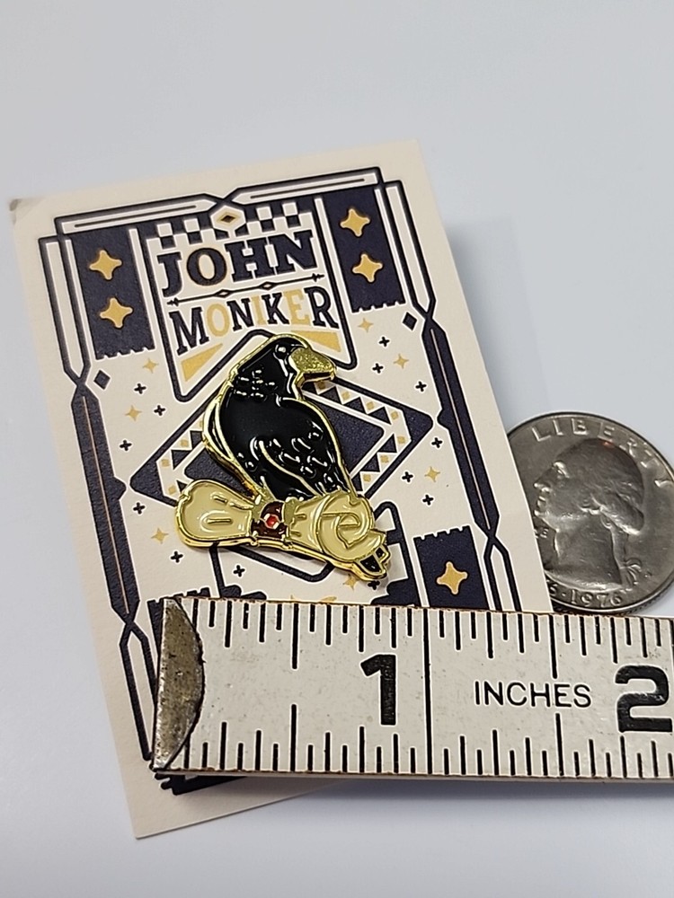 Black Bird with a Scroll Lapel Pin