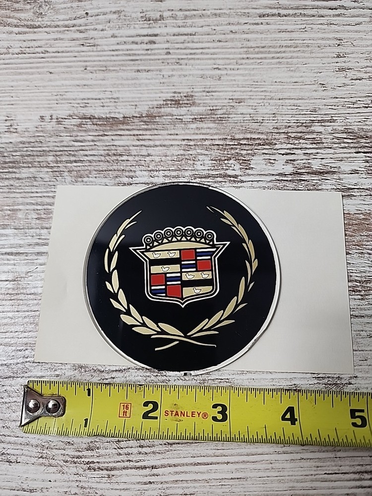 Black Background Cadillac Logo On Hard Plastic