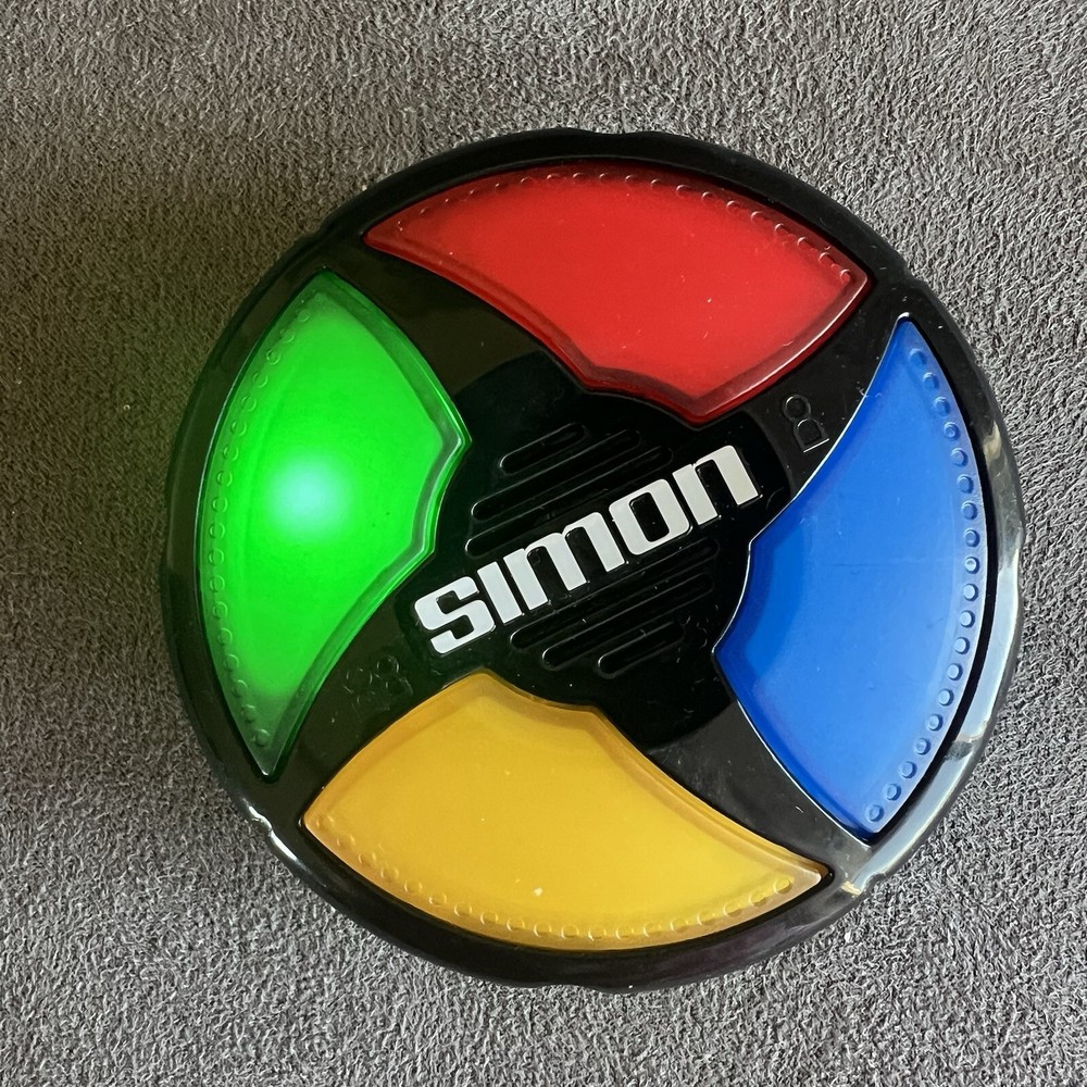 Hasbro Simon Micro Series Electronic Handheld Game. Tested, Works Great Clean