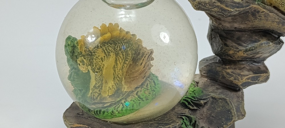 Stegosaurus Water Globe. 4.5" Tall.