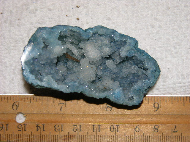 Geode cut & polished half with colored crystal center 2.5 inch E28