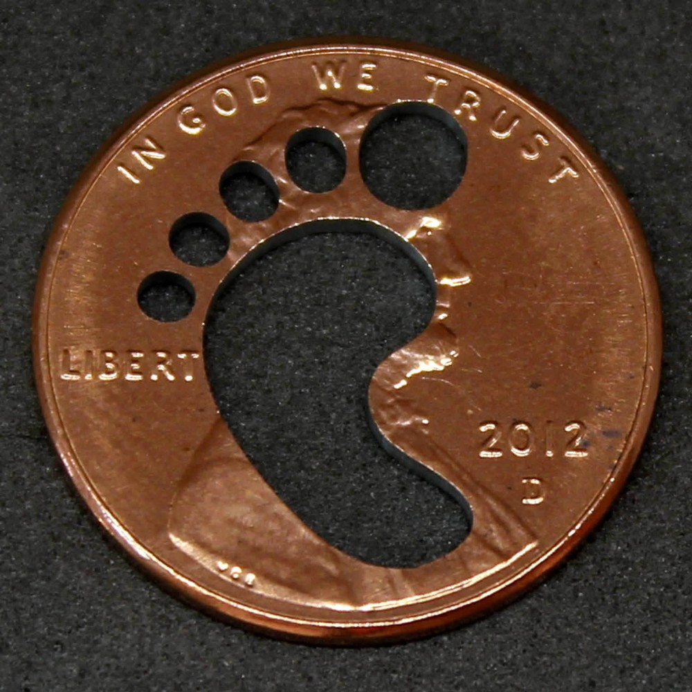 Lucky Penny with foot print cut out