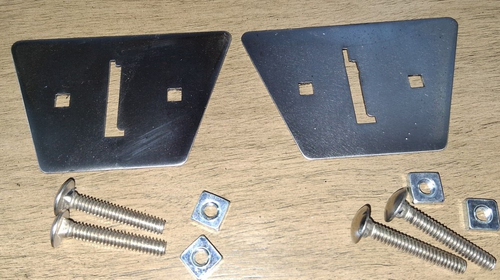 Two Gottlieb coin entry plates and hardware