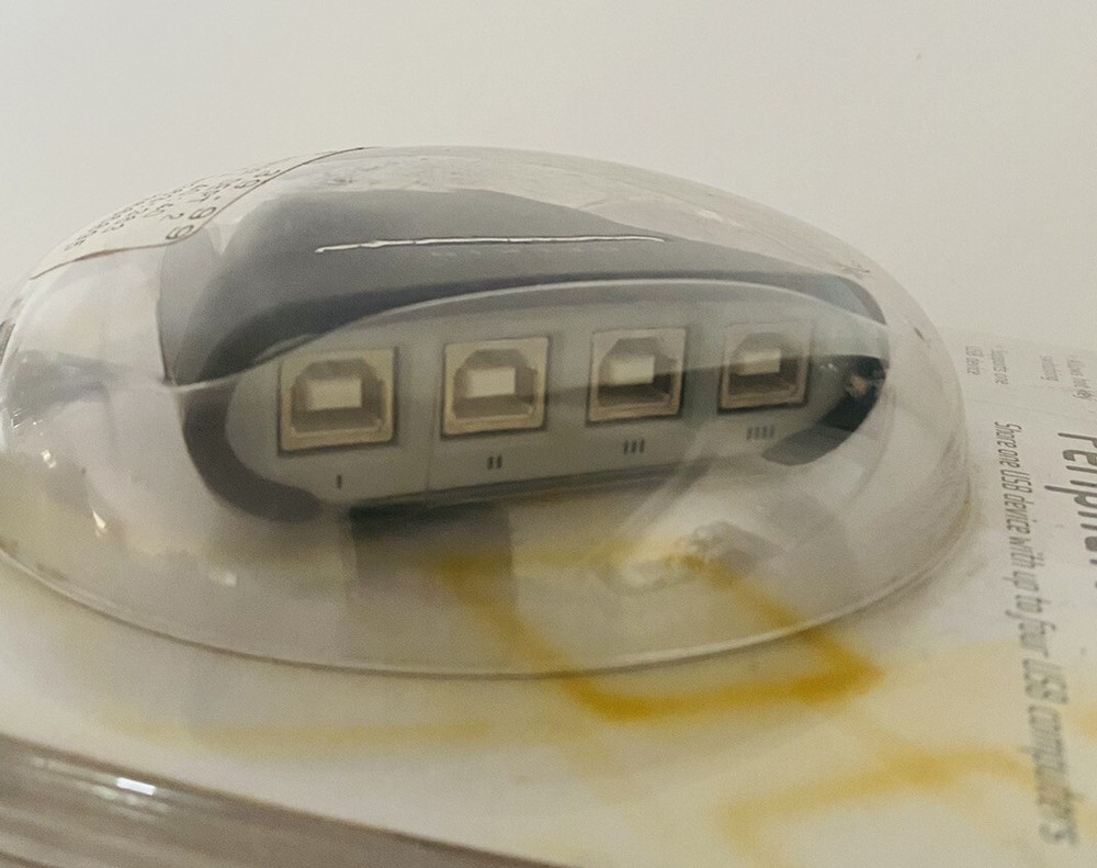 Belkin USB 4X1 PERIPHERAL SWITCH (F1U401)