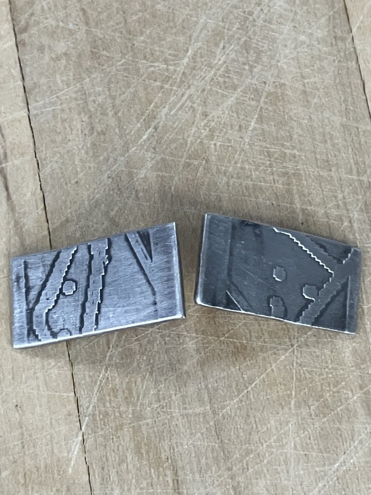 Handcrafted sterling silver studs featuring oxidized Southwestern Style Native