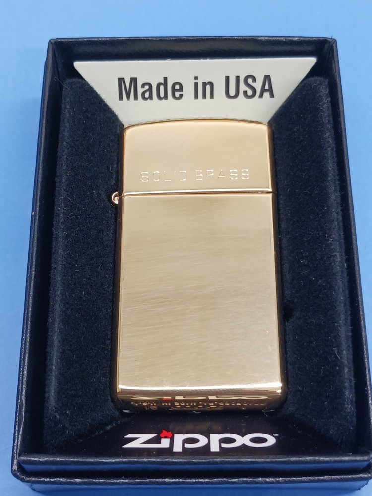 Zippo Slim High Polish Brass with Solid Brass Engraved 1654