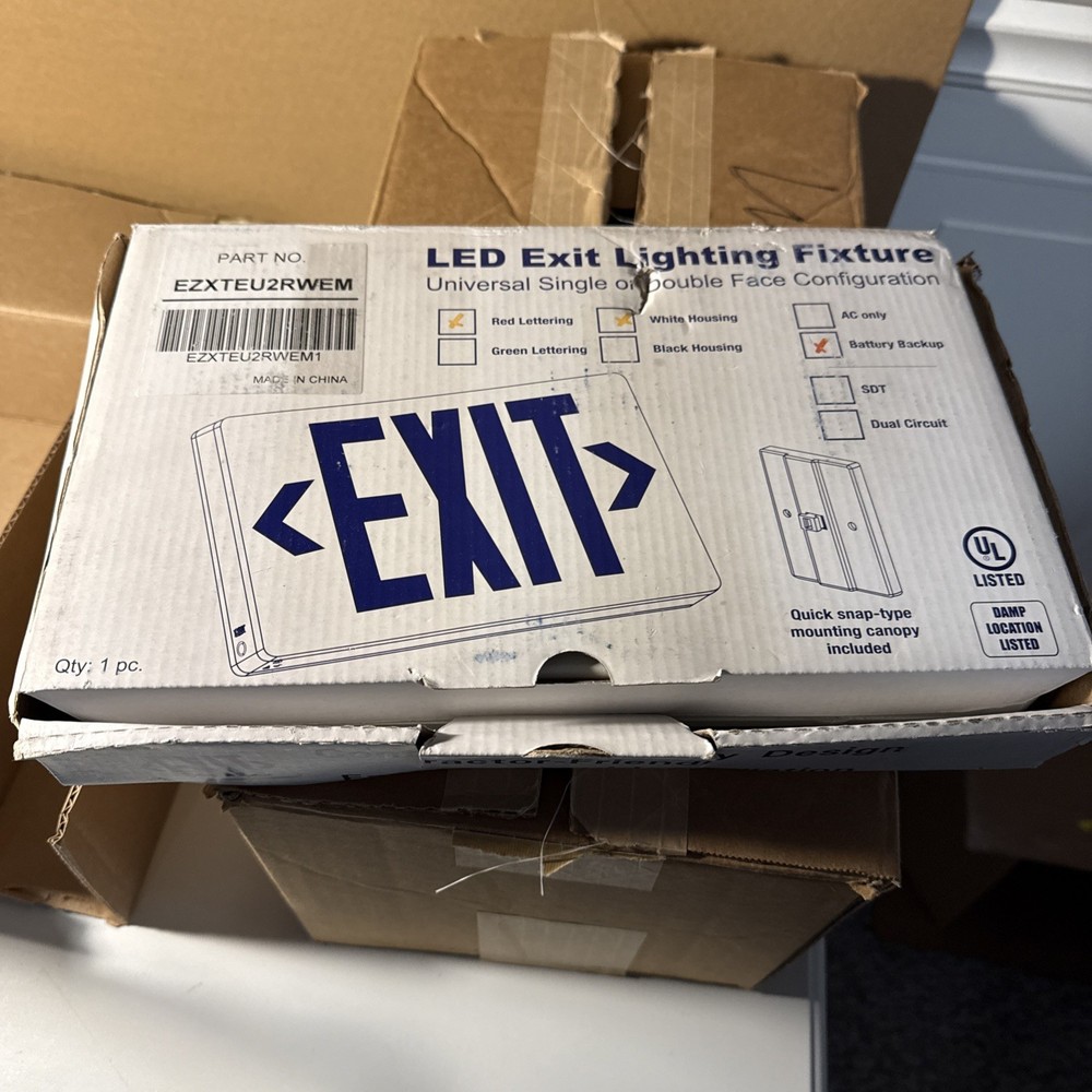 Red Light White Housing Battery Back Up Exit Sign.