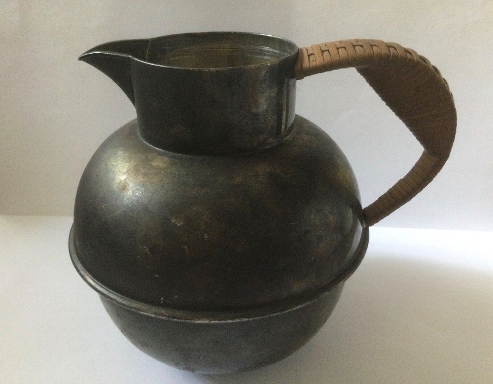 vintage silver plated pitcher with rattan handle
