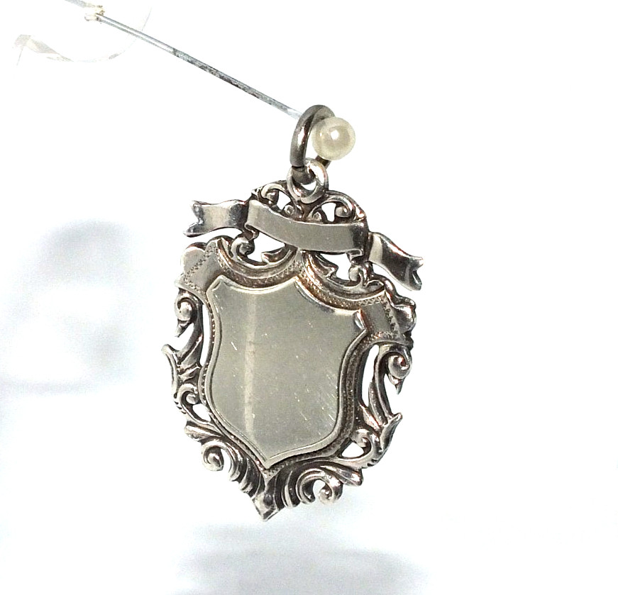 Gents/mens ornate solid silver shield shaped fob