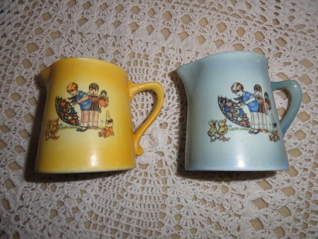 AVC O CHINA CREAM PITCHERS 2 PCS. 3" HIGH