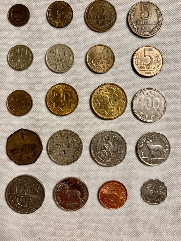 35 Assortment World Wide Coins.