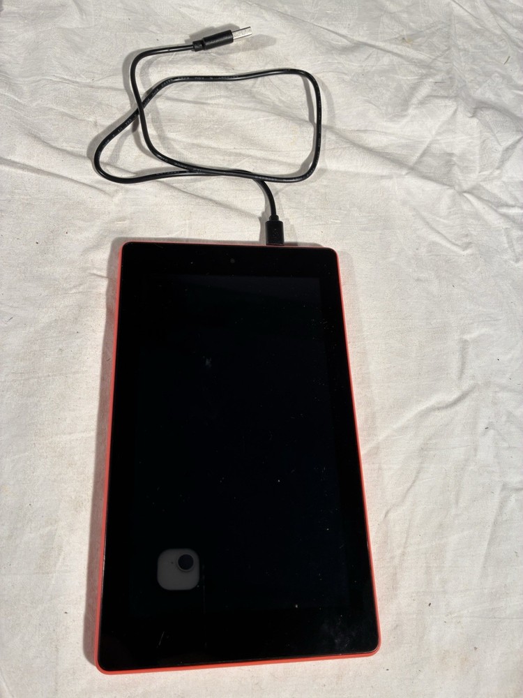 Used Orange Fire Tablet Works Perfectly. Lightly Used