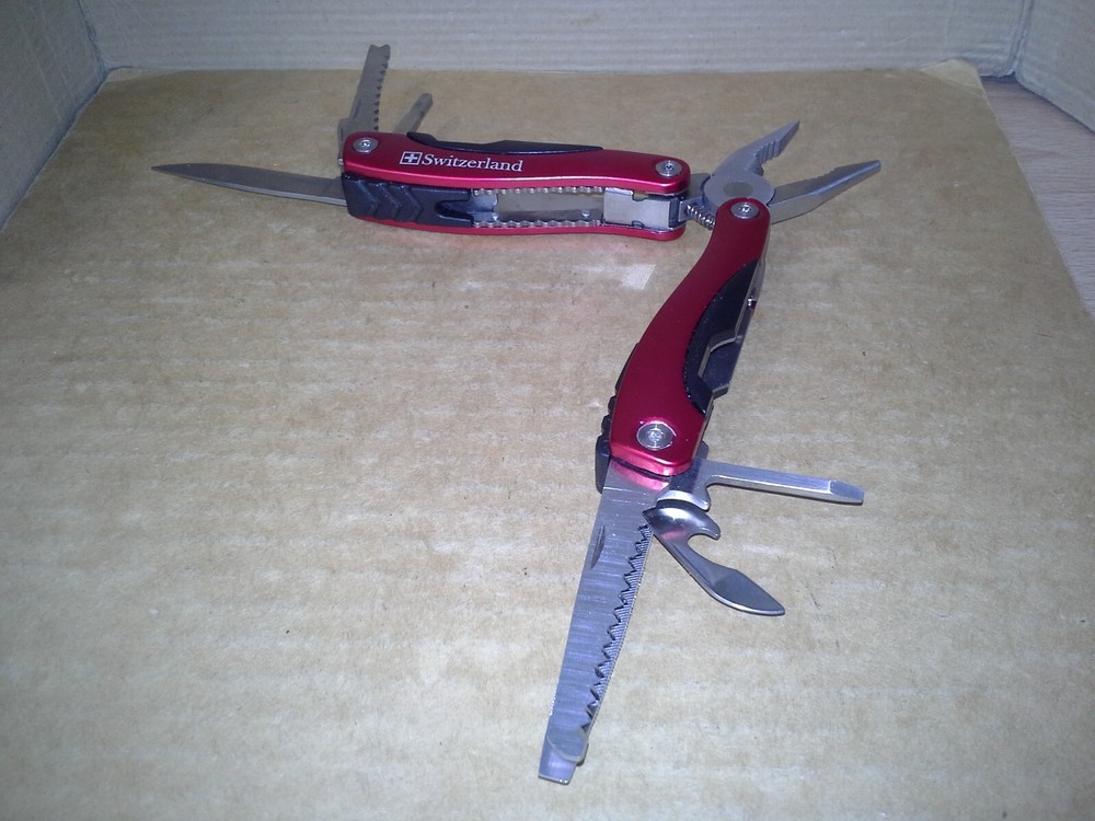 Switzerland Red Multitool Folding Pocket Pliers. VGC