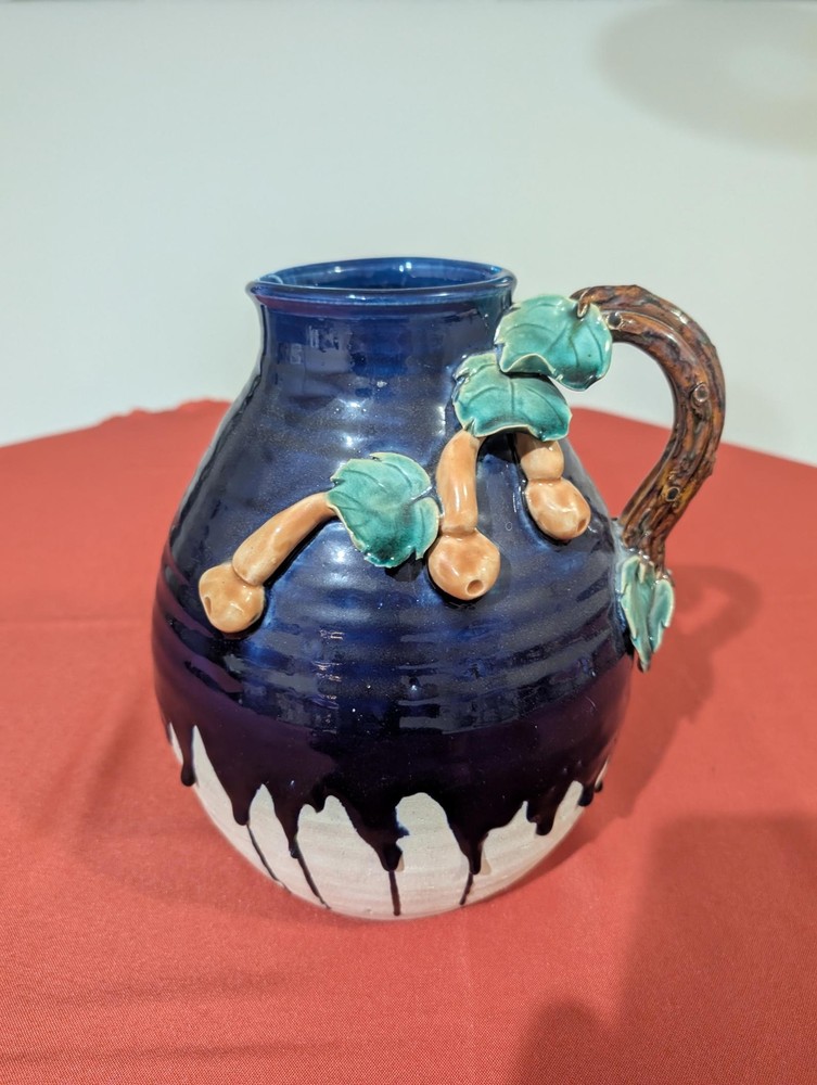 Artisan Ceramic Pitcher with Leaf Design