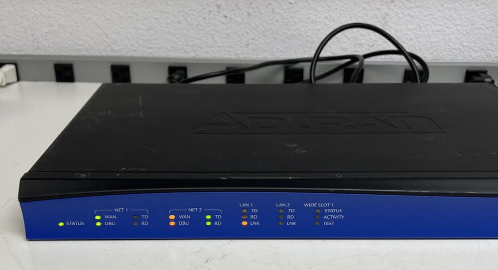 Adtran NetVanta 4305 Router 1202890E1 w/Octel T1/E1 Module 1202843E1