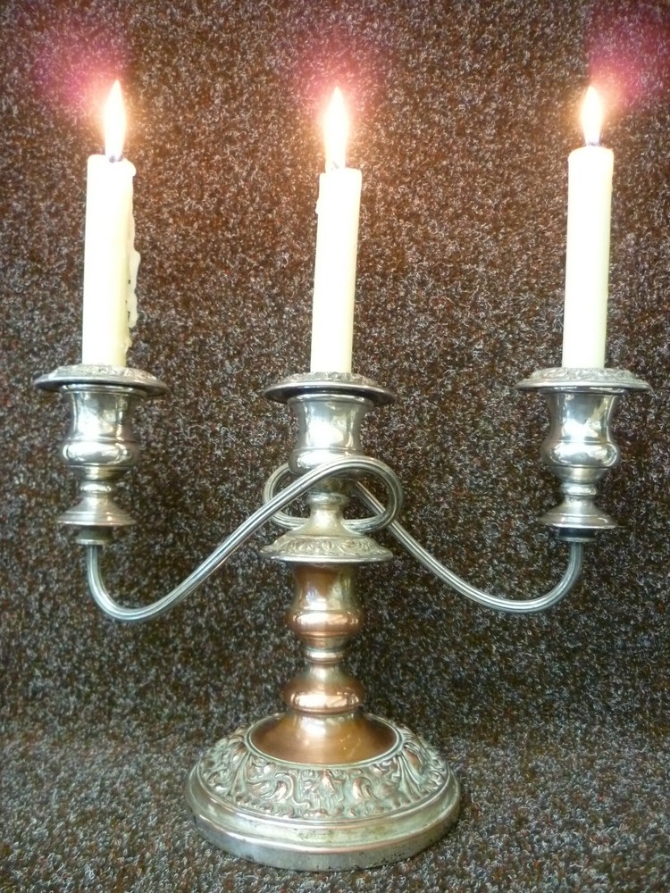 THREE VICTORIAN SILVER ON COPPER CANDLESTICKS, TWO STICKS AND ONE CANDELABRA