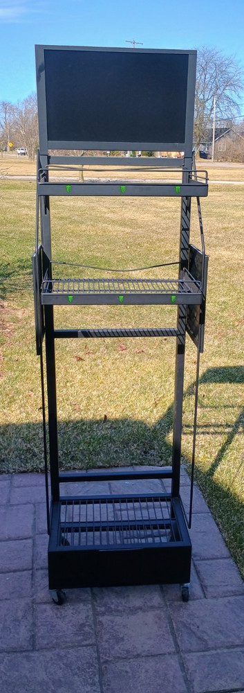 Monster Energy drinks display shelf on wheels that lock and with inserts