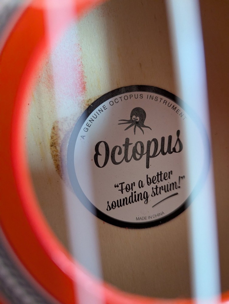 Octopus Soprano Ukulele Red with 4 Strings Includes Case for Beginners