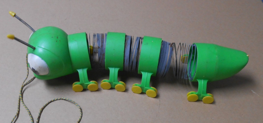 Vintage Caterpillar Slinky Pull Toy